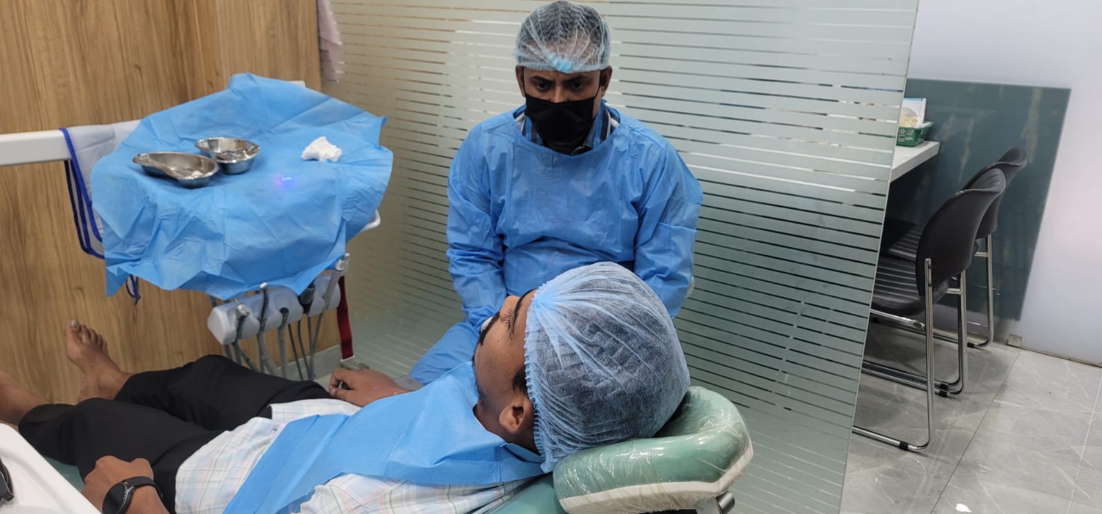 Dentist consulting with a patient